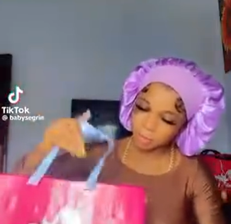 Lady with a black eye shows off gift she got from her boyfriend on her birthday
