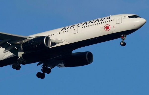 Air Canada apologizes after kicking put passengers who refused to sit on vomit-covered seats