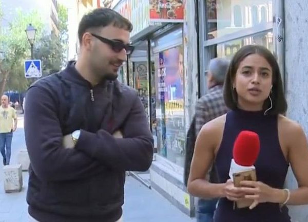 Police arrest man for touching a female reporter’s bum on live TV before asking her which television channel she worked for