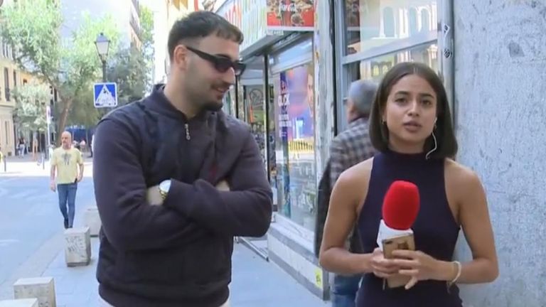Police arrest man for touching a female reporter’s bum on live TV before asking her which television channel she worked for