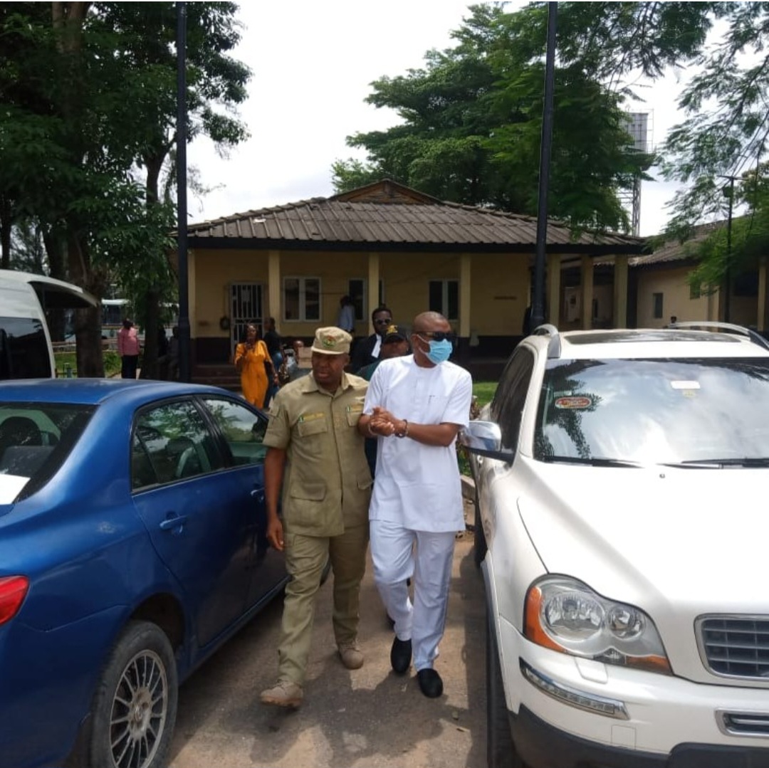 Dr Olufemi Olaleye seen being escorted out of court after he was sentenced to life imprisonment for r@ping wife