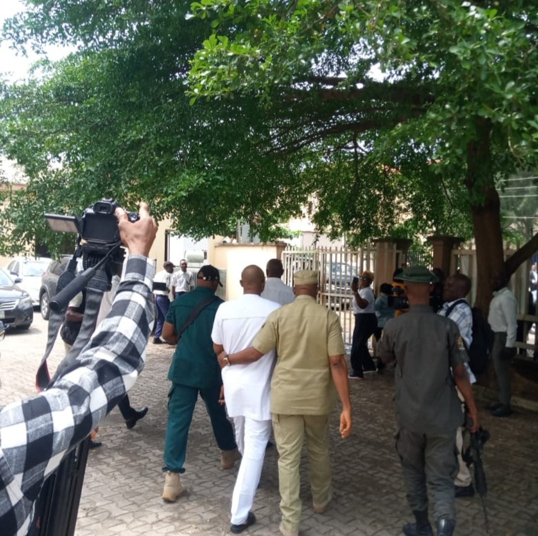 Dr Olufemi Olaleye seen being escorted out of court after he was sentenced to life imprisonment for r@ping wife