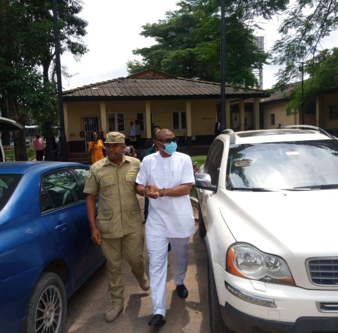 Dr Olufemi Olaleye seen being escorted out of court after he was sentenced to life imprisonment for r@ping wife