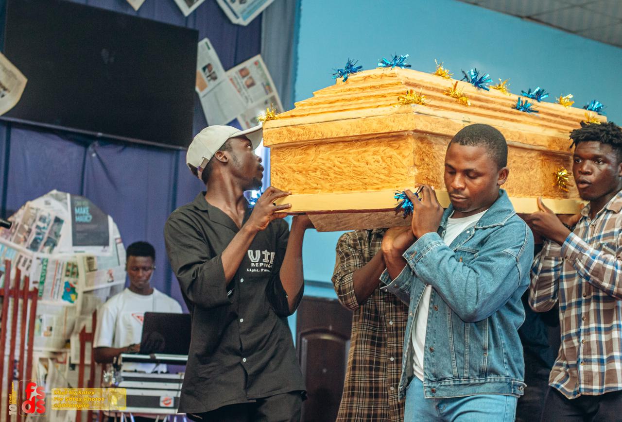Nigerian gospel artiste causes a stir after arriving at church in a casket to preach about 