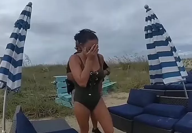 Woman arrested after she was caught moaning while m@sturbating with vibrator on a beach