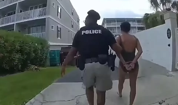 Woman arrested after she was caught moaning while m@sturbating with vibrator on a beach