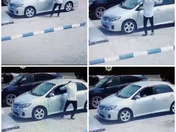 CCTV captures moment thief smashed window of a parked car and stole an item inside it