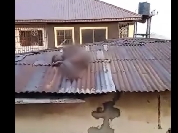 VIDEO: N@ked person creates a scene after being spotted on a roof in Benin