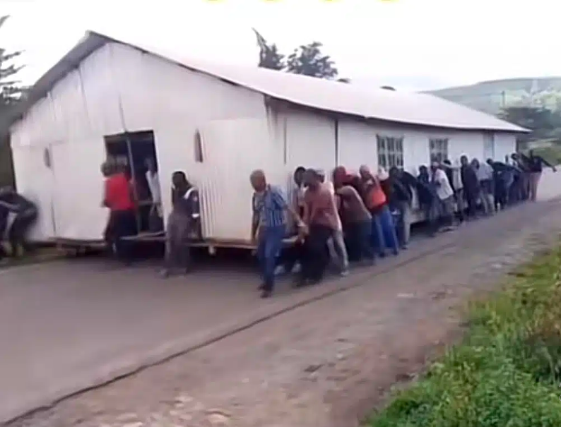 Church members uproot church and carry it away after their pastor’s wife allegedly refused to serve them tea during their visit (video)