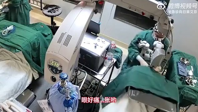 Moment doctor punches 82-year-old patient in the face three times while performing surgery on her eyes because she kept moving (Video)