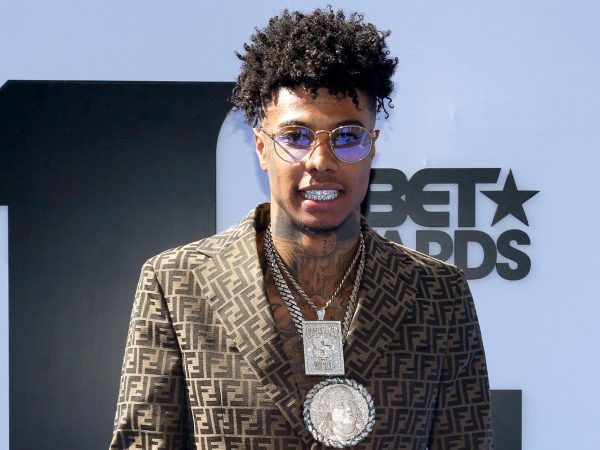 Rapper Blueface throws female fan off stage