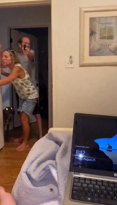 Watch Enraged man shoot his stepson for taunting him before shooting himself despite pleas from half dressed girlfriend (video)