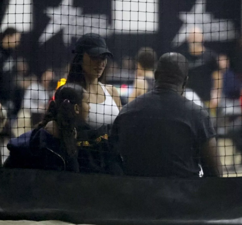Kanye West and Kim Kardashian in tense show down as they exchange words in front of daughter Chicago while attending son’s game