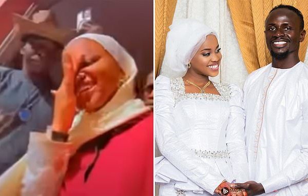 Sadio Mane’s 18-year-old wife gets a grand reception as she returns to school as over 100 schoolmates gather to receive her after her wedding to the footballer (Video)