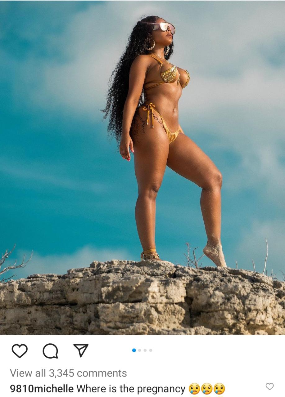 Ashanti shows hint of tiny baby bump after photo of her flat tummy raised questions