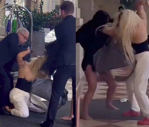 Boobs fly out as two women fight in a hotel lobby (video)