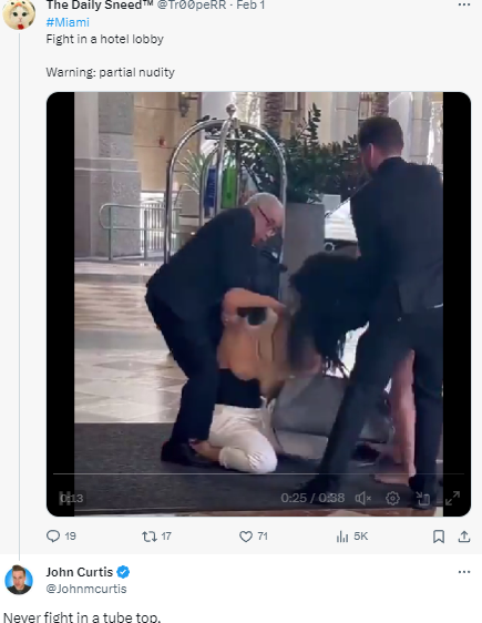 Boobs fly out as two women fight in a hotel lobby (video)