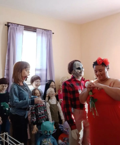 Woman marries alien figure boyfriend years after marrying zombie doll wife and having 10 rag doll kids