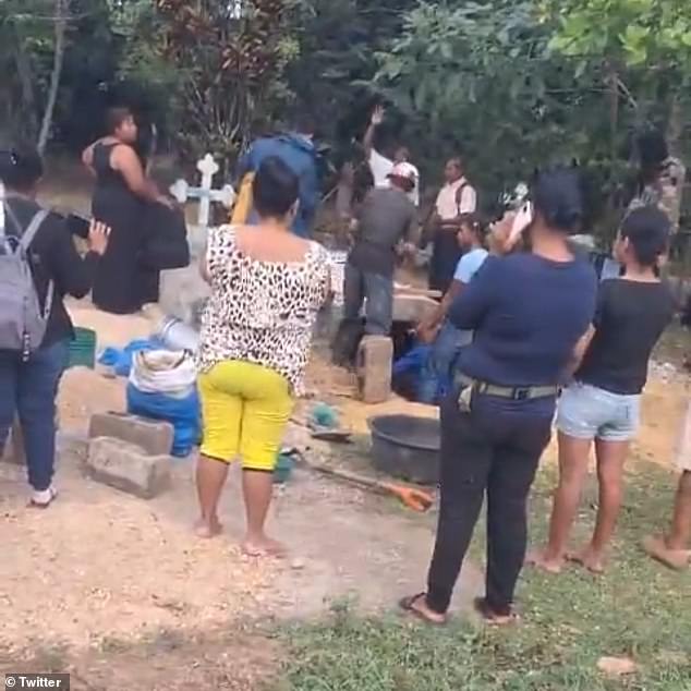 Parents exhume corpse of daughter, 24, out of cemetery after they received a call to her cellphone from someone claiming ‘she was alive’ (video)