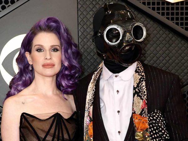 Singer Kelly Osbourne’s partner Sid Wilson rocks gas mask to the Grammys