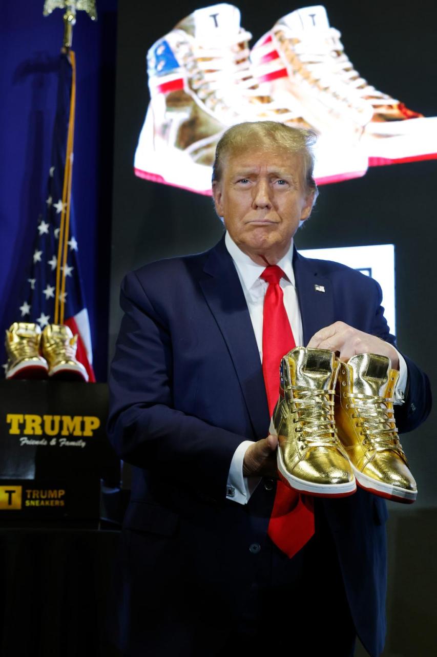 Russian CEO wins autographed golden Donald Trump sneakers after record breaking K bid (video)