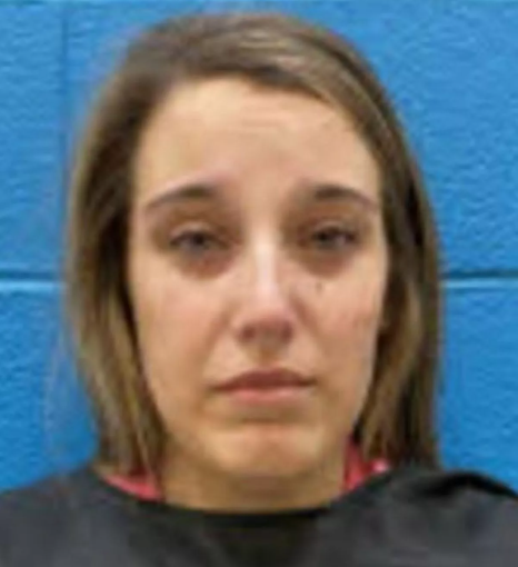 School guidance counsellor and volleyball coach taken into custody after allegedly engaging in a sex act with an underage student at her school