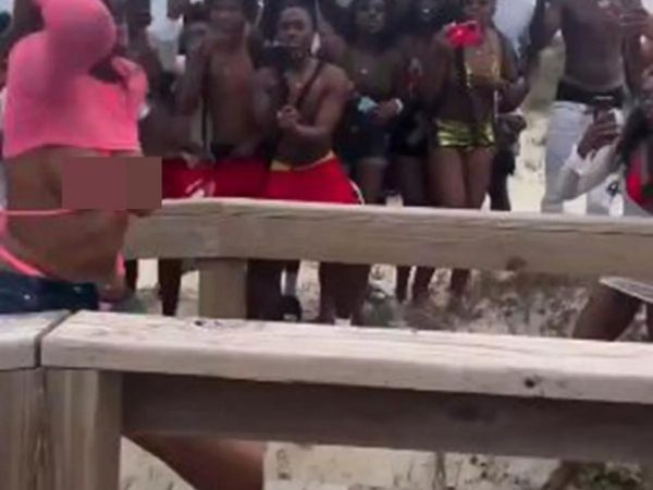 Breasts fall out of bikinis as women fight during spring break outing (photos/video)