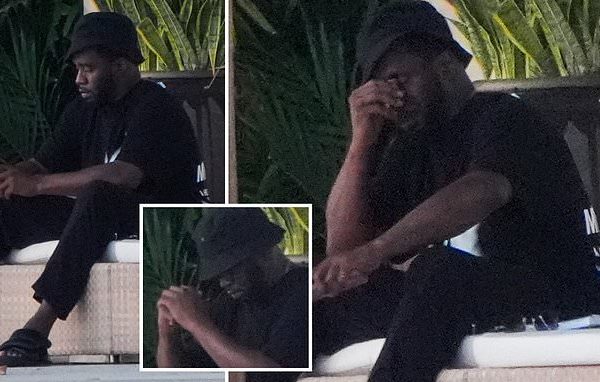 Diddy pictued looking stressed outside his Miami mansion amid mounting lawsuits and sex trafficking probe