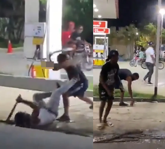 Man calmly picks his severed hand from the ground after machete fight that was caught on camera