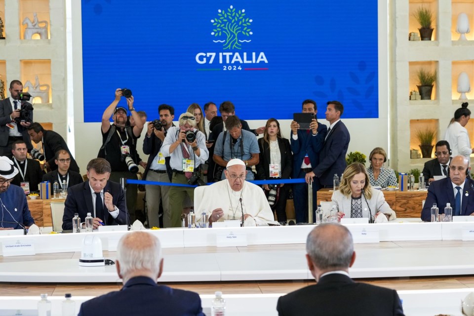 Pope Francis makes history as the first pope to attend the G7 summit, raises alarm about AI