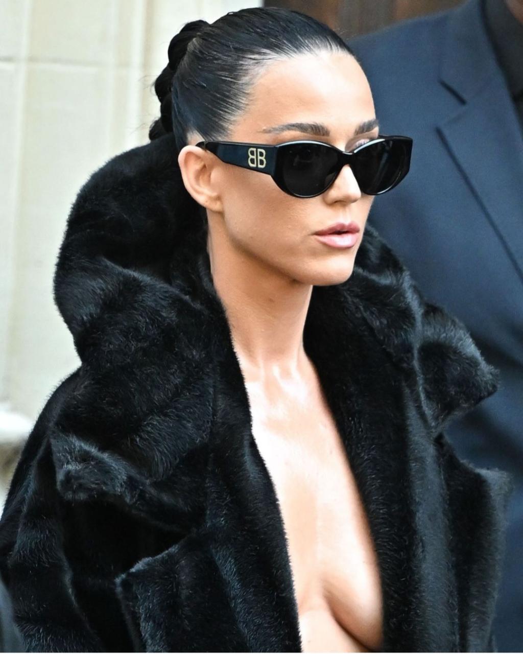 Kate Perry, 39, exposes boobs and abs as she goes braless in coat for Balenciaga Haute Coutre during Paris Fashion Week