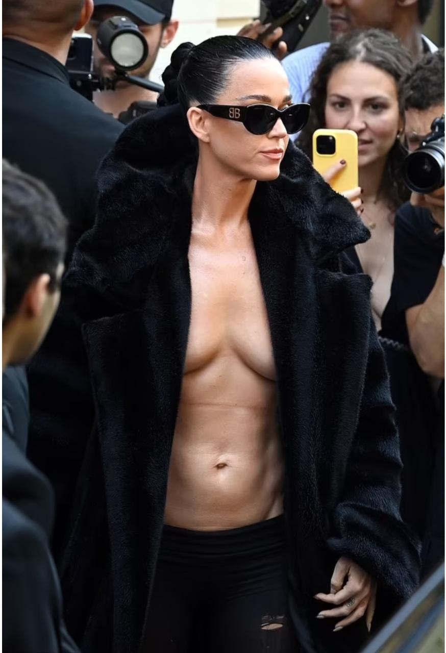Kate Perry, 39, exposes boobs and abs as she goes braless in coat for Balenciaga Haute Coutre during Paris Fashion Week