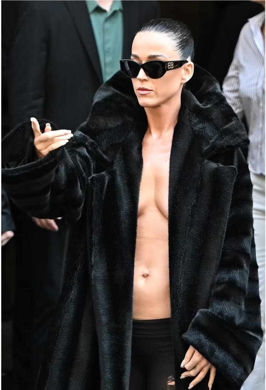 Kate Perry, 39, exposes boobs and abs as she goes braless in coat for Balenciaga Haute Coutre during Paris Fashion Week