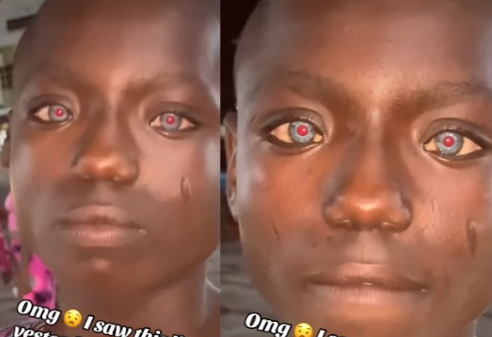 Lady in awe after spotting little boy with red and blue eyes (video)