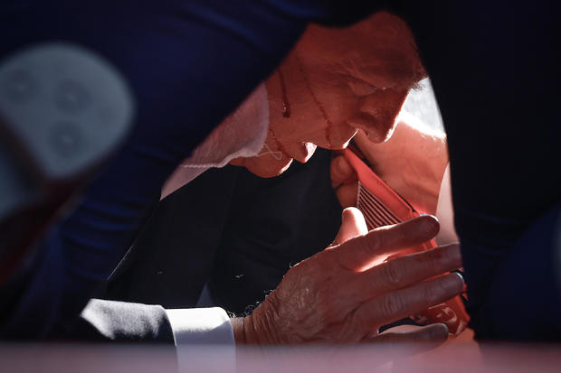Donald Trump with Secret Service after incident at rally 