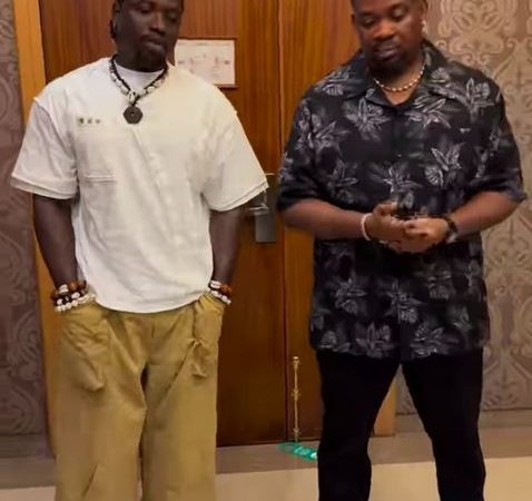 Very Dark Man Left Speechless As Don Jazzy Gifts Him A Huge Sum Of Money After Visiting Him (Video)